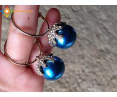 Les boucles d'oreilles